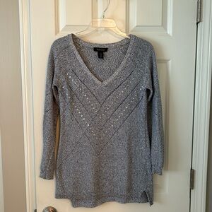 White House Black Market light blue summer weight sweater with metallic threads.